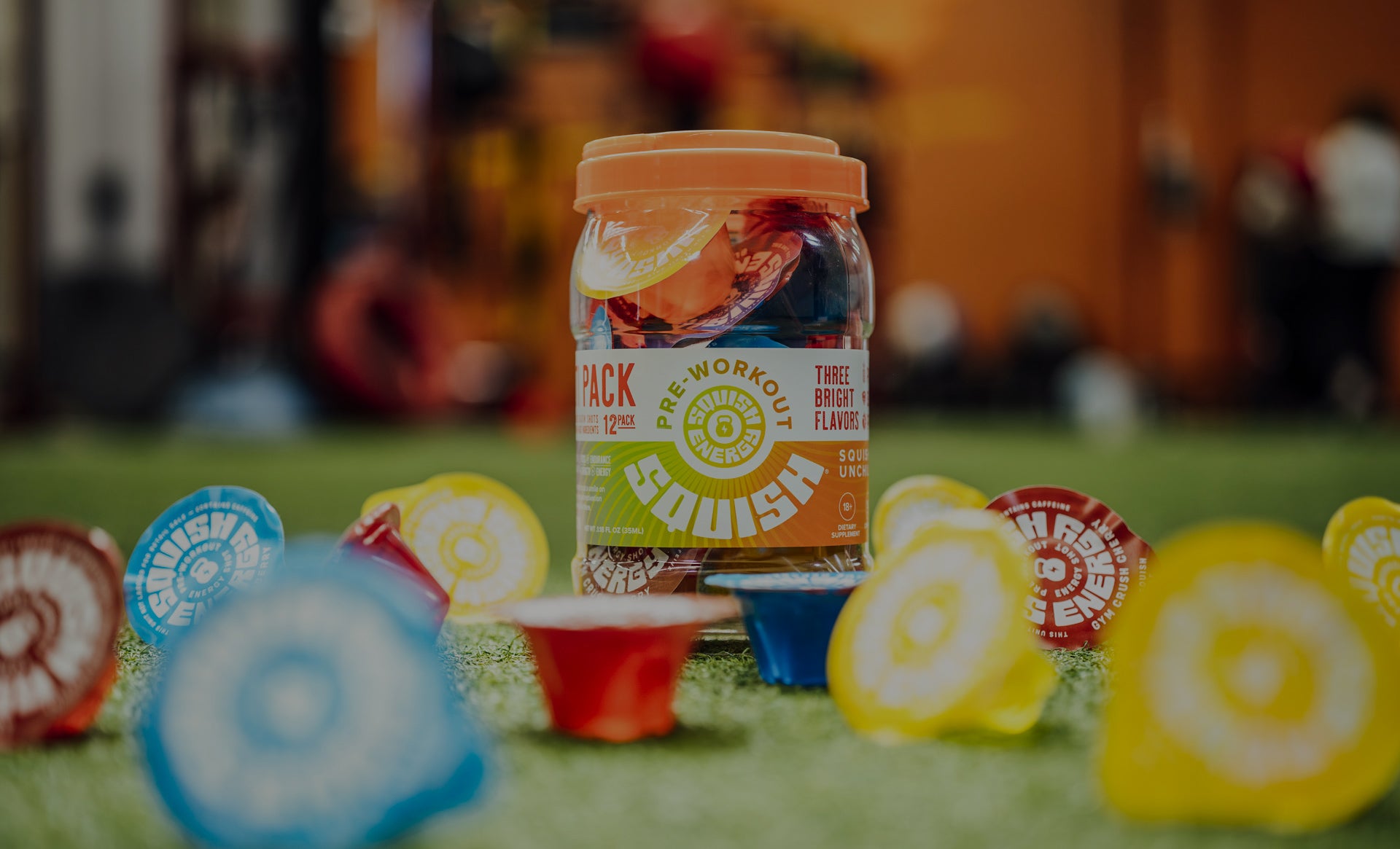 Squish Energy pre-workout shot pack with colorful supplements to boost energy.